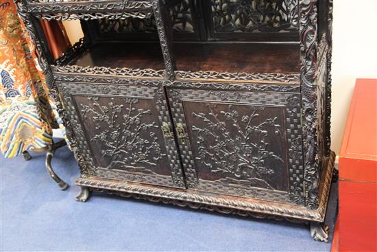 A Chinese black lacquered rosewood cabinet, late 19th century, W.3ft 9in. H.7ft D.1ft 5in.